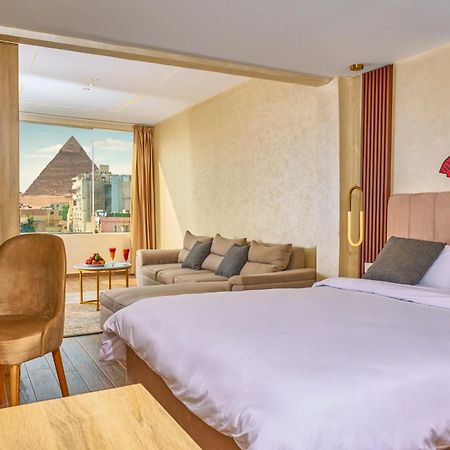 Hotel Cleopatra Tower Pyramid View à Kafret el-Gabal Extérieur photo