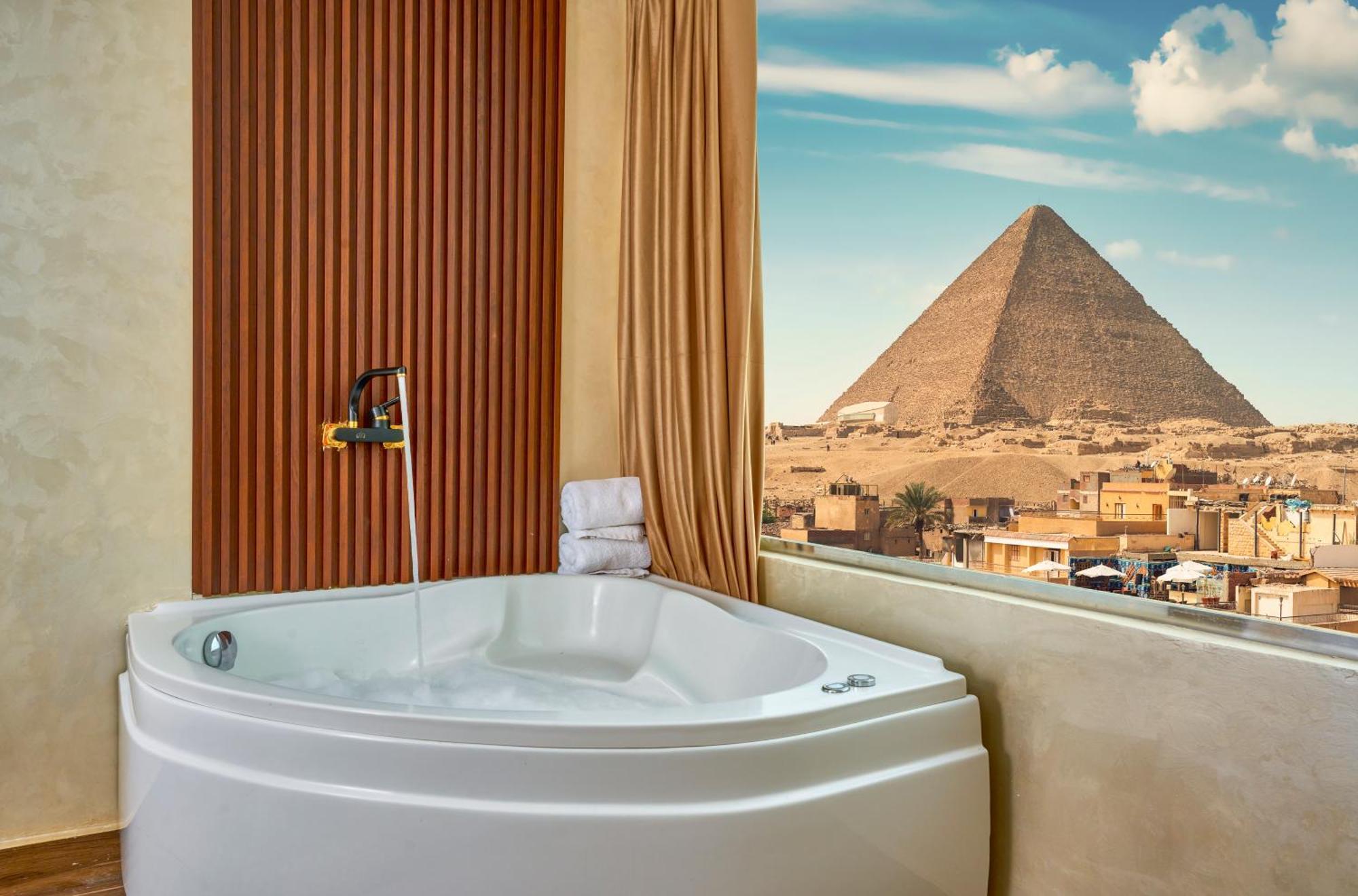 Hotel Cleopatra Tower Pyramid View à Kafret el-Gabal Extérieur photo