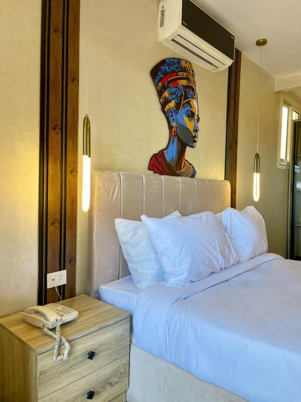 Hotel Cleopatra Tower Pyramid View à Kafret el-Gabal Extérieur photo