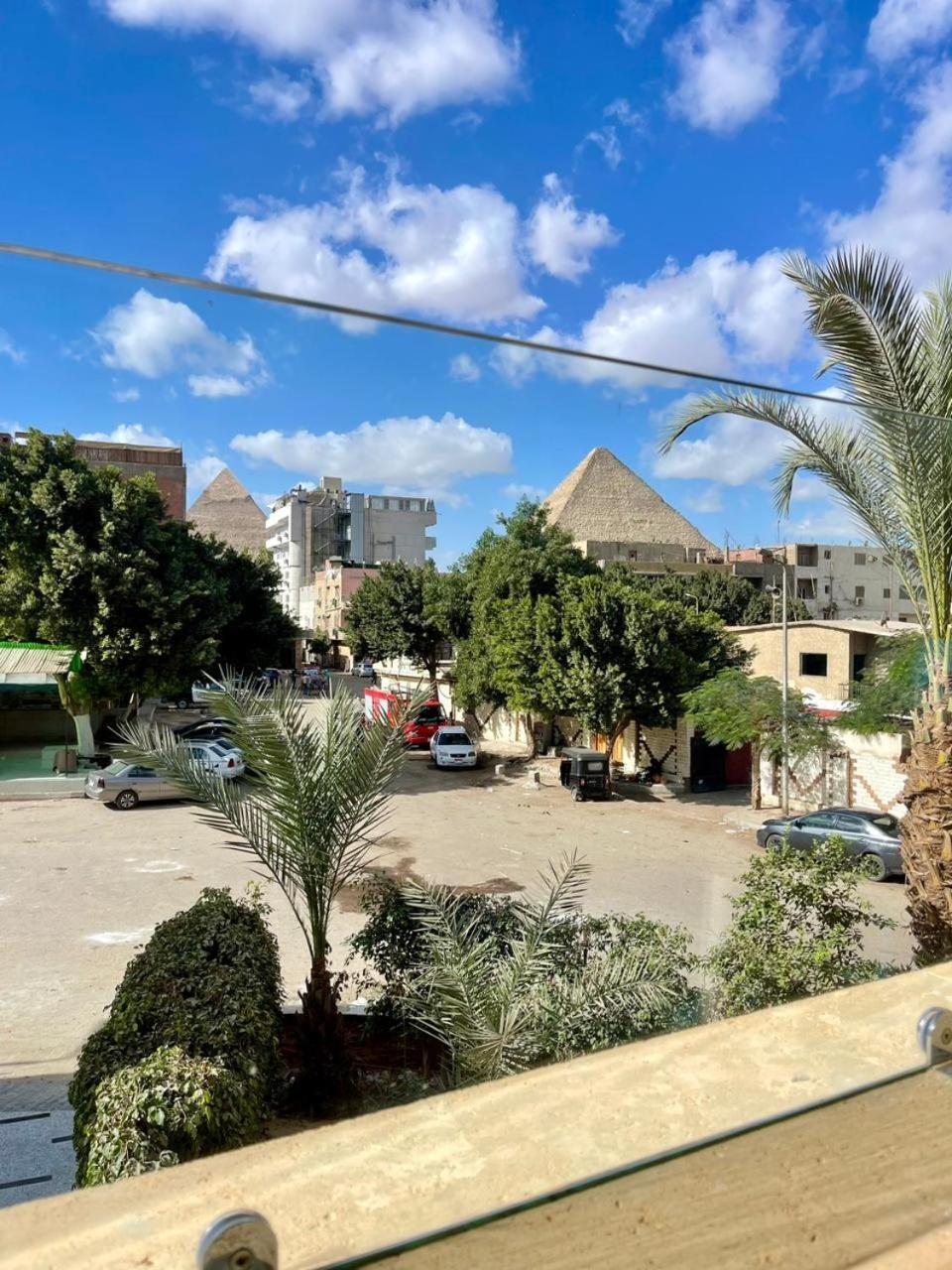 Hotel Cleopatra Tower Pyramid View à Kafret el-Gabal Extérieur photo