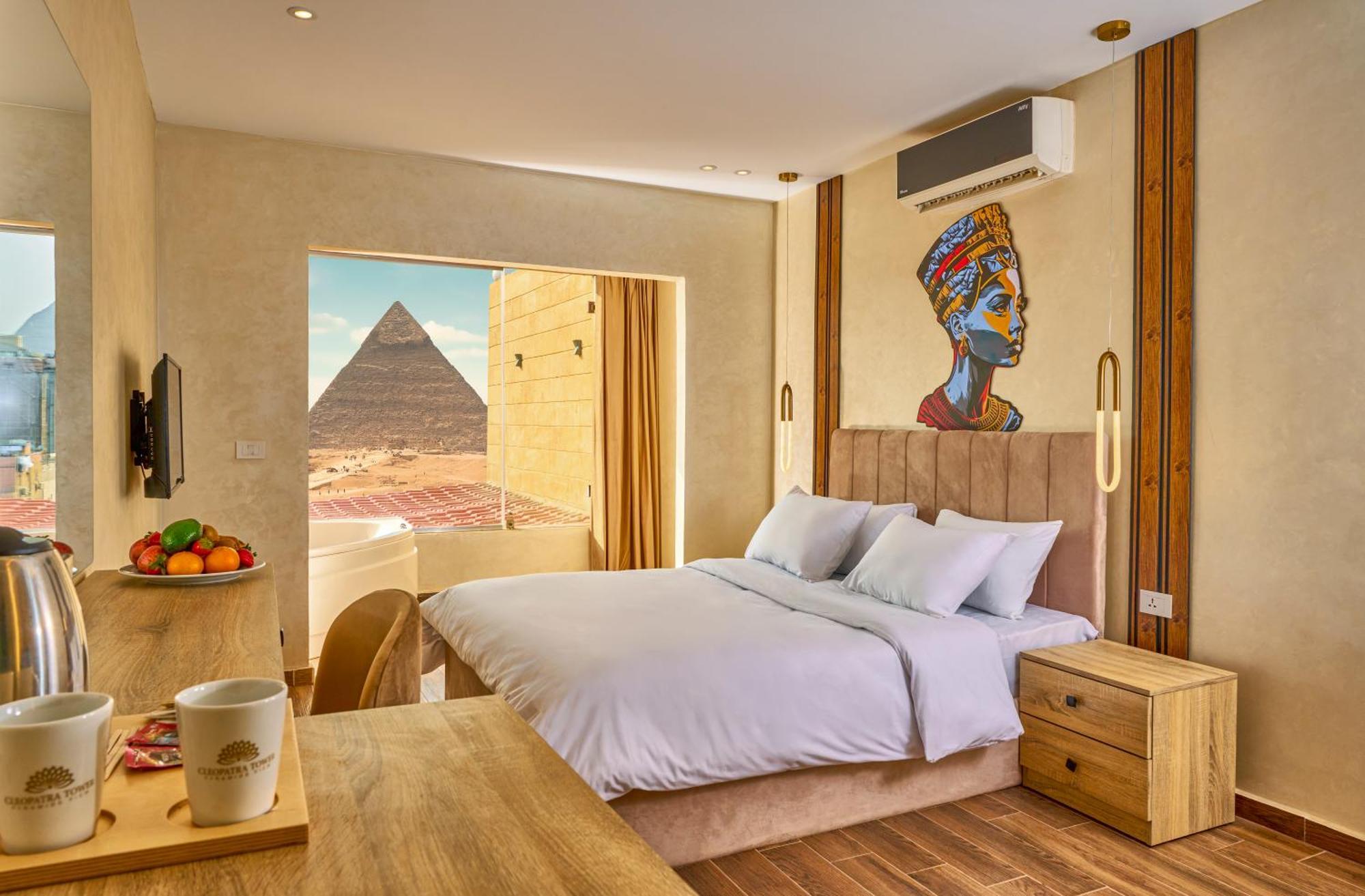 Hotel Cleopatra Tower Pyramid View à Kafret el-Gabal Extérieur photo